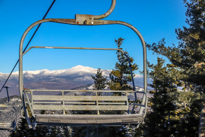 Chairlift with Beautiful View of Mountains at Attitash