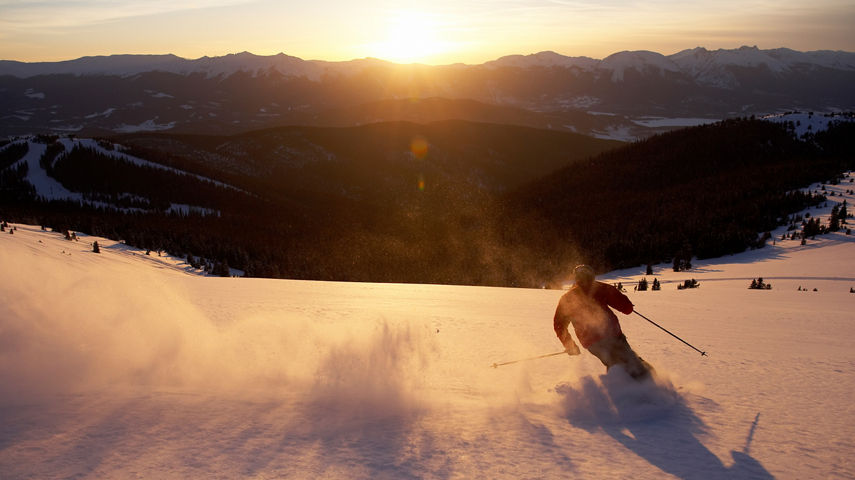 Skier in Powder at Sunset in Keystone, CO.