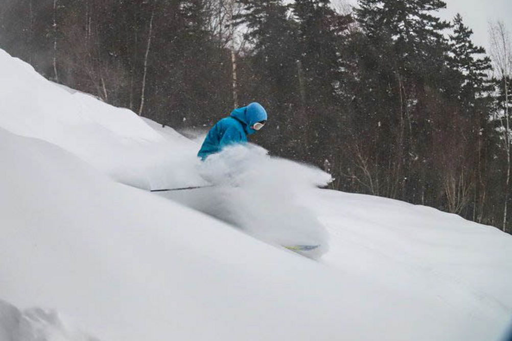 Skier Turns Through Fresh Snow at Attitash