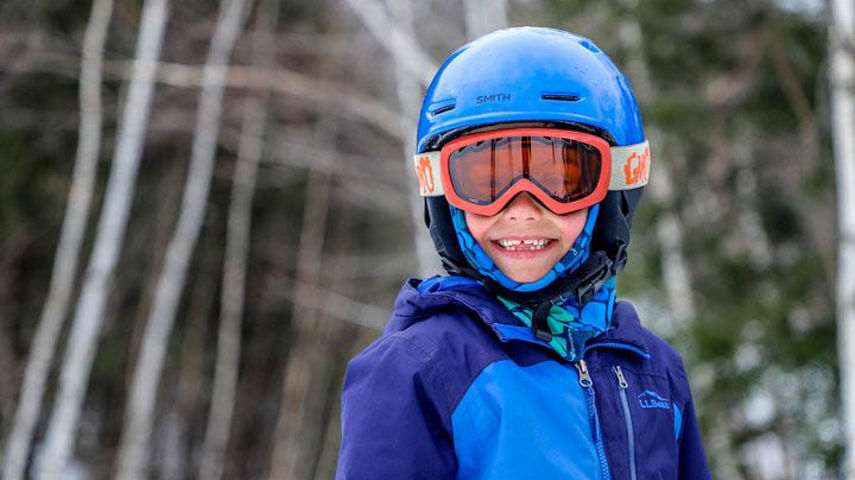 Little Boy Takes a Break on the Ski Run at Attitash
