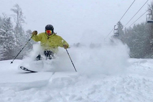 Skier Turns Through Fresh Powder at Attitash