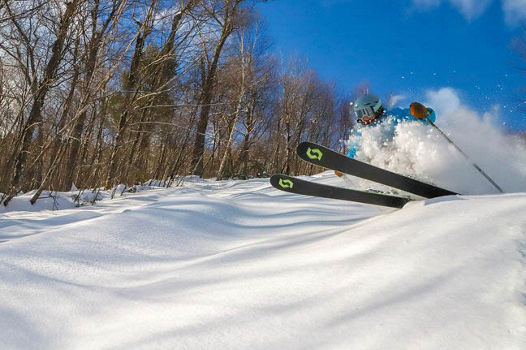 Skier Turns Through Fresh Powder at Attitash