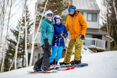 Family Takes a Break on Ski Run at Attitash