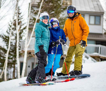 Family Takes a Break on Ski Run at Attitash