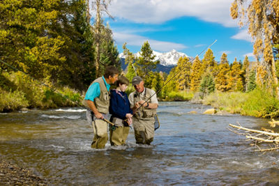 Father and Son Fish In Keystone, CO.