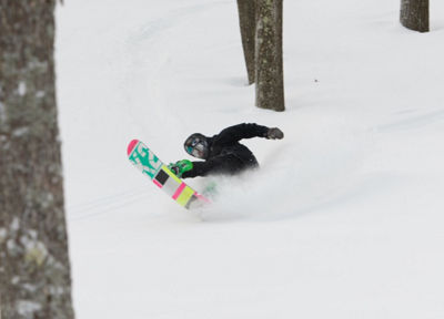 Snowboarder Makes Turns in Fresh Powder at Jack Frost