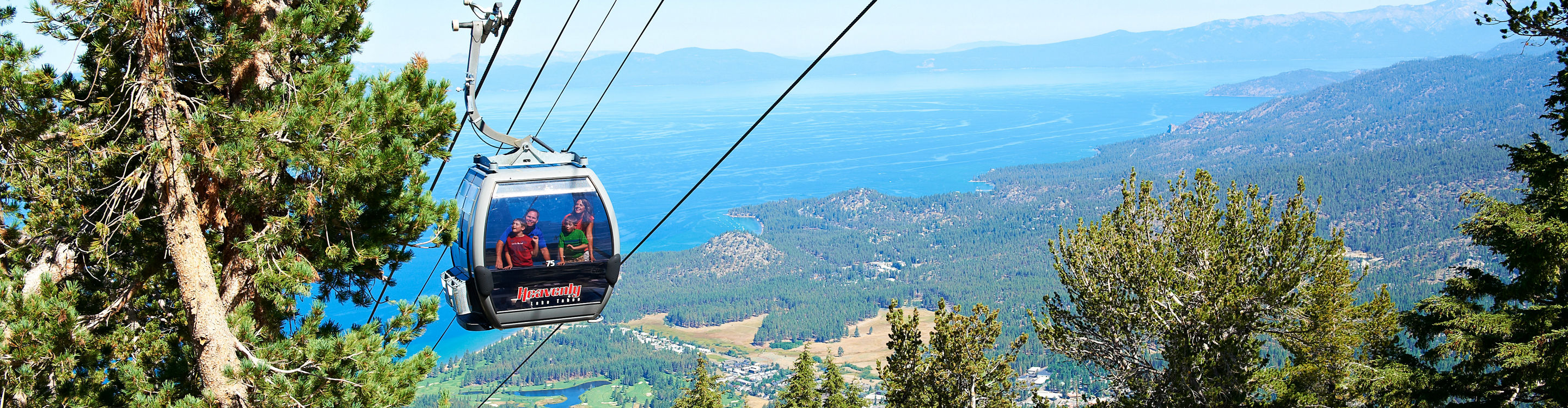 Family rides Gondola to Mountain Top Activities in Heavenly, CA.