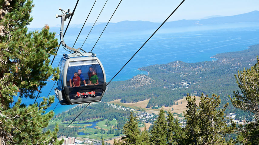 Family rides Gondola to Mountain Top Activities in Heavenly, CA.