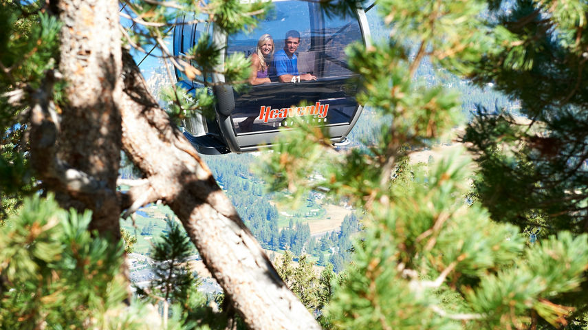 Family rides Gondola to Mountain Top Activities in Heavenly, CA.