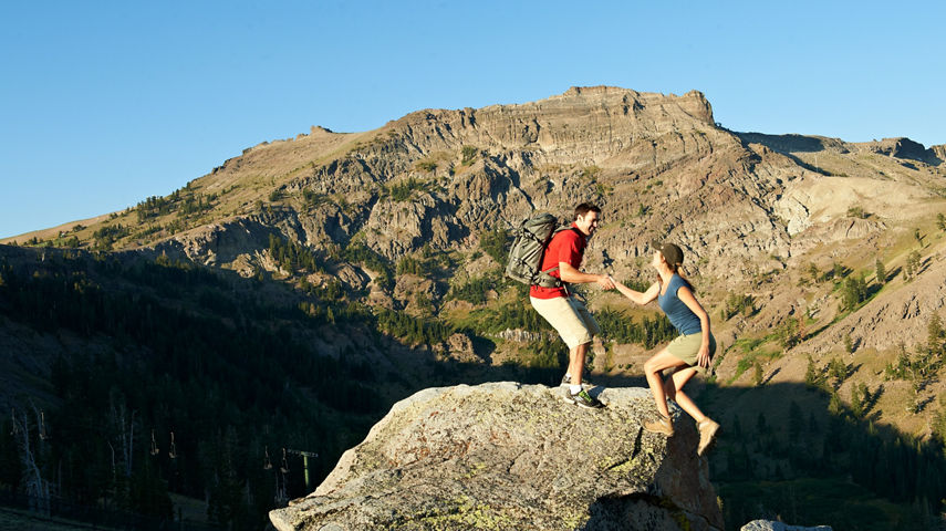 A couple goes hiking in Kirkwood, CA.
