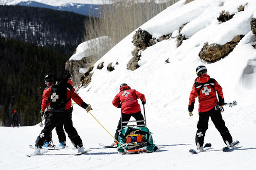 Ski Patrol with Avalanche Rescue Dog In Vail, CO.