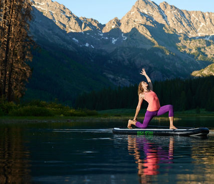 Stand up paddle board yoga in Piney Lake in Vail, CO.