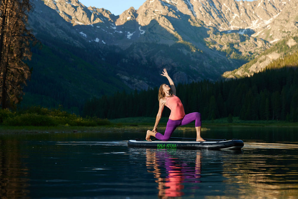 Stand up paddle board yoga in Piney Lake in Vail, CO.