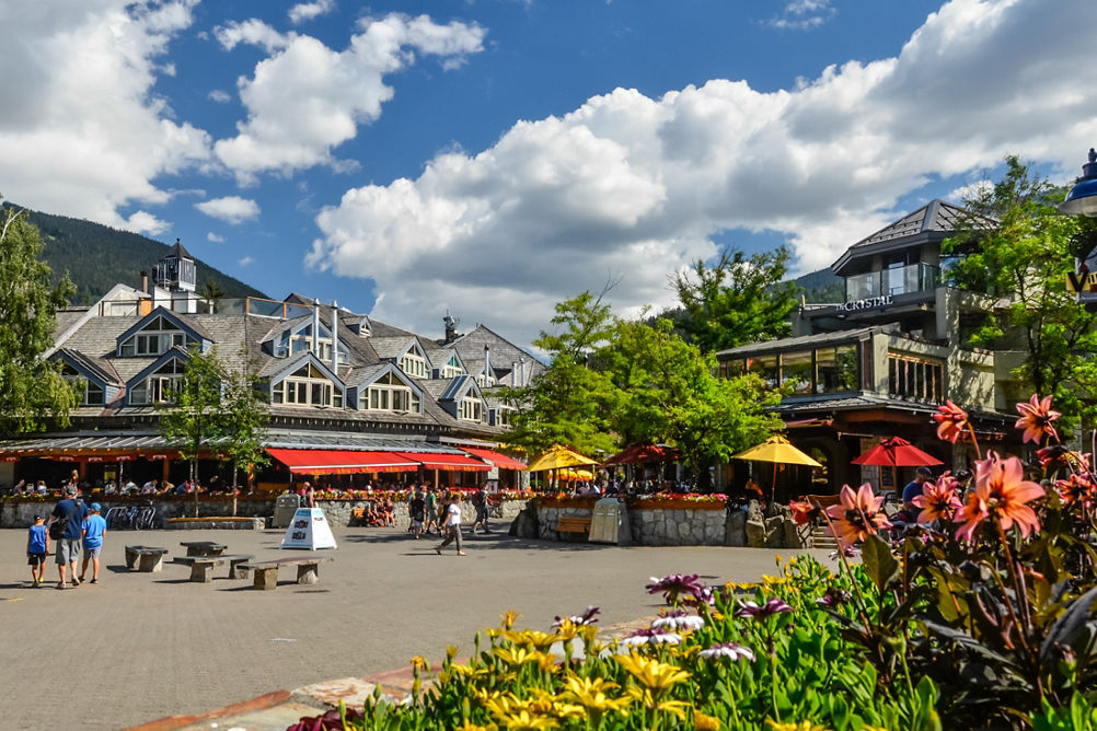 Whistler Village Square, people strolling in the summer