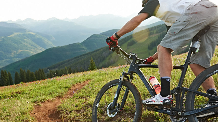 Sunrise mountain biking on Mountain in Vail, CO.
