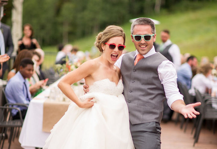 The bride and groom pose during their wedding at Park City Mountain Resort, UT.