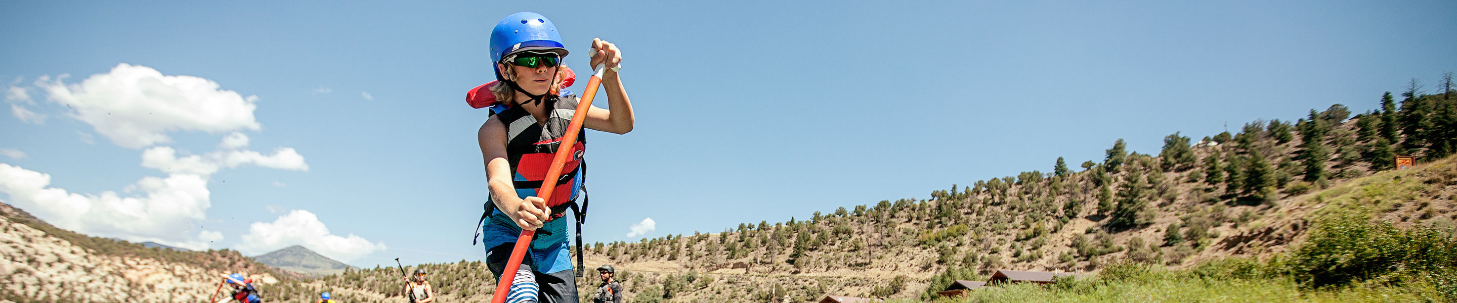 Stand Up Paddleboarding at Kids Camp in Beaver Creek, CO.