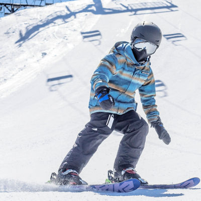 Little Boy Skis Under the Chairlift at Jack Frost