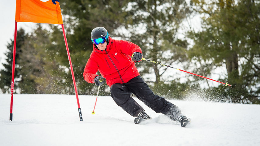 Adult Skier Racing Gates In Afton Alps, MN.