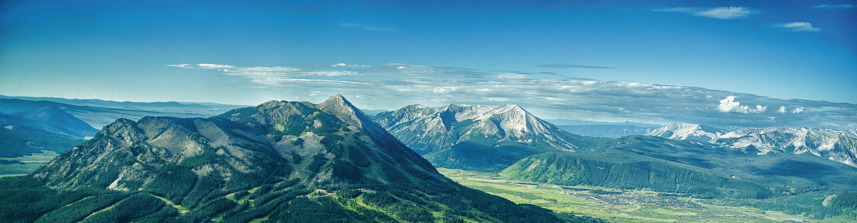 Aerial view of the town and mountain in Crested Butte, CO.