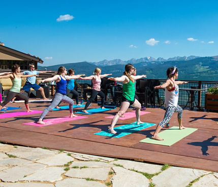 Yoga at Mid-Vail Deck on Mountain in Vail, CO.