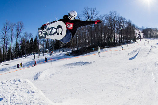 Snowboarder Hits Feature in Fife & Drum Park at Roundtop