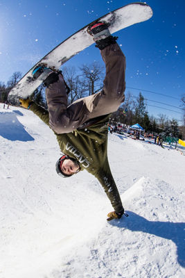 Snowboarder Hits Feature in Fife & Drum Park at Roundtop