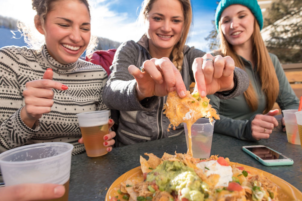 Young and Independents enjoy apres after skiing in Vail, CO.