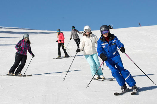 Adult women's ski school at Wilmot Mountain