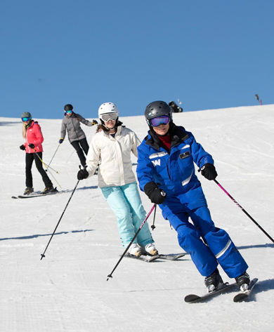 Adult women's ski school at Wilmot Mountain
