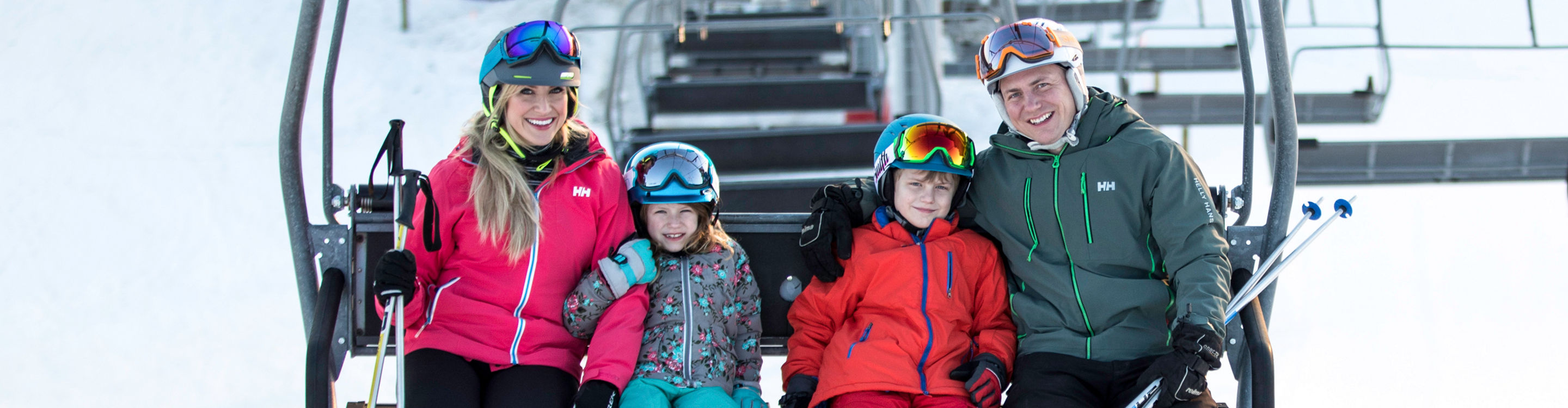Family skiing together at Wilmot Mountain