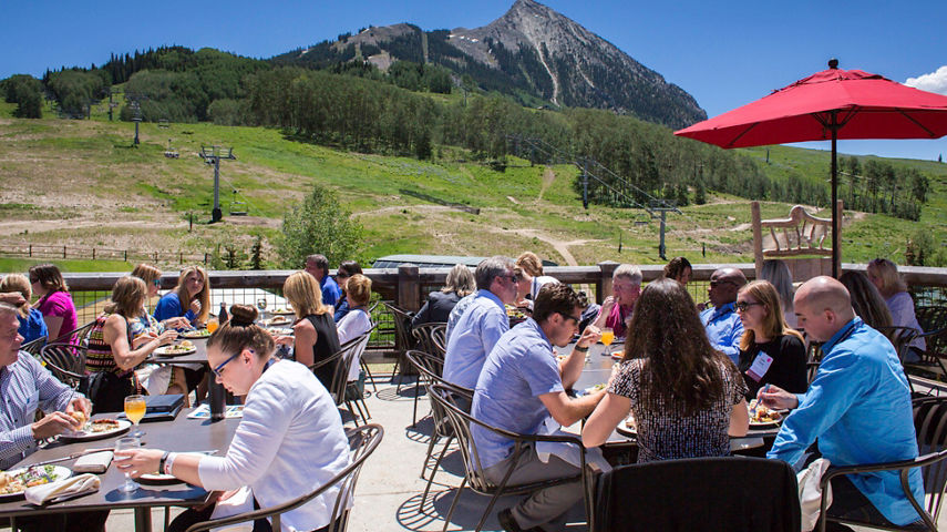 Guests dine on the deck of Butte 66 in Crested Butte, CO.