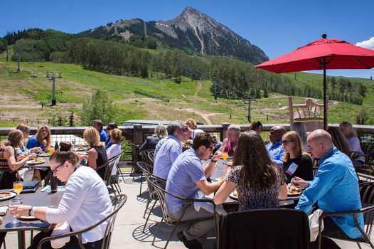 Guests dine on the deck of Butte 66 in Crested Butte, CO.