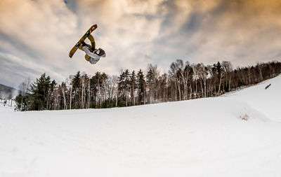 Snowboarder Does Backflip at Terrain Park at Mount Snow