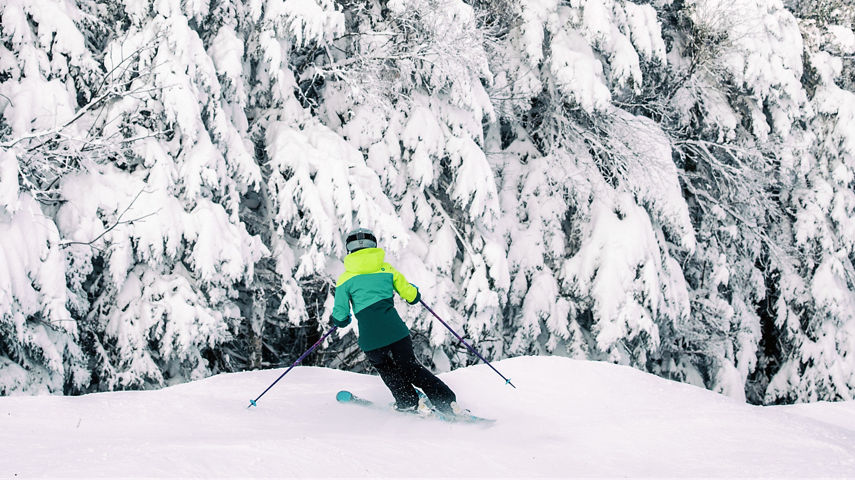 Skier Makes Turn on Snowy Day at Mount Snow