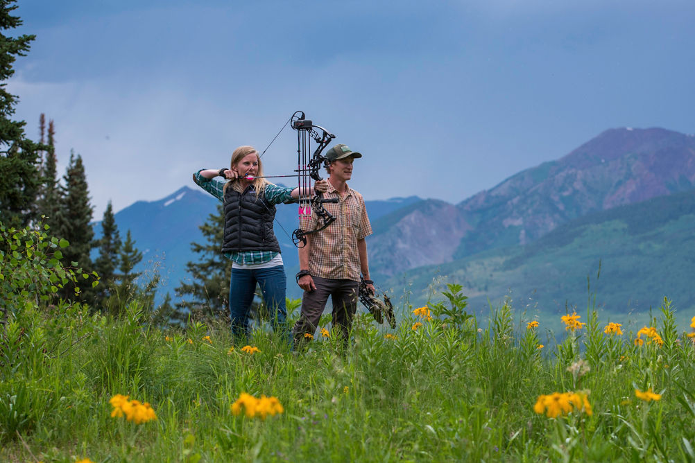 Archery amongst wildflowers in Crested Butte, CO.