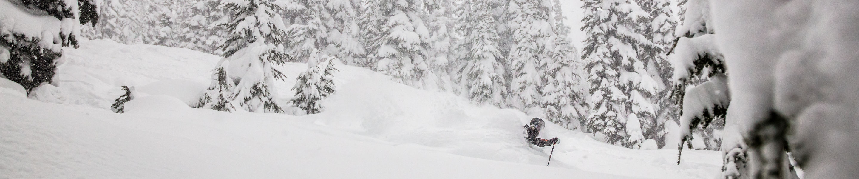 Keaton Carlson Skiing Powder underneath Whistler Village Gondola