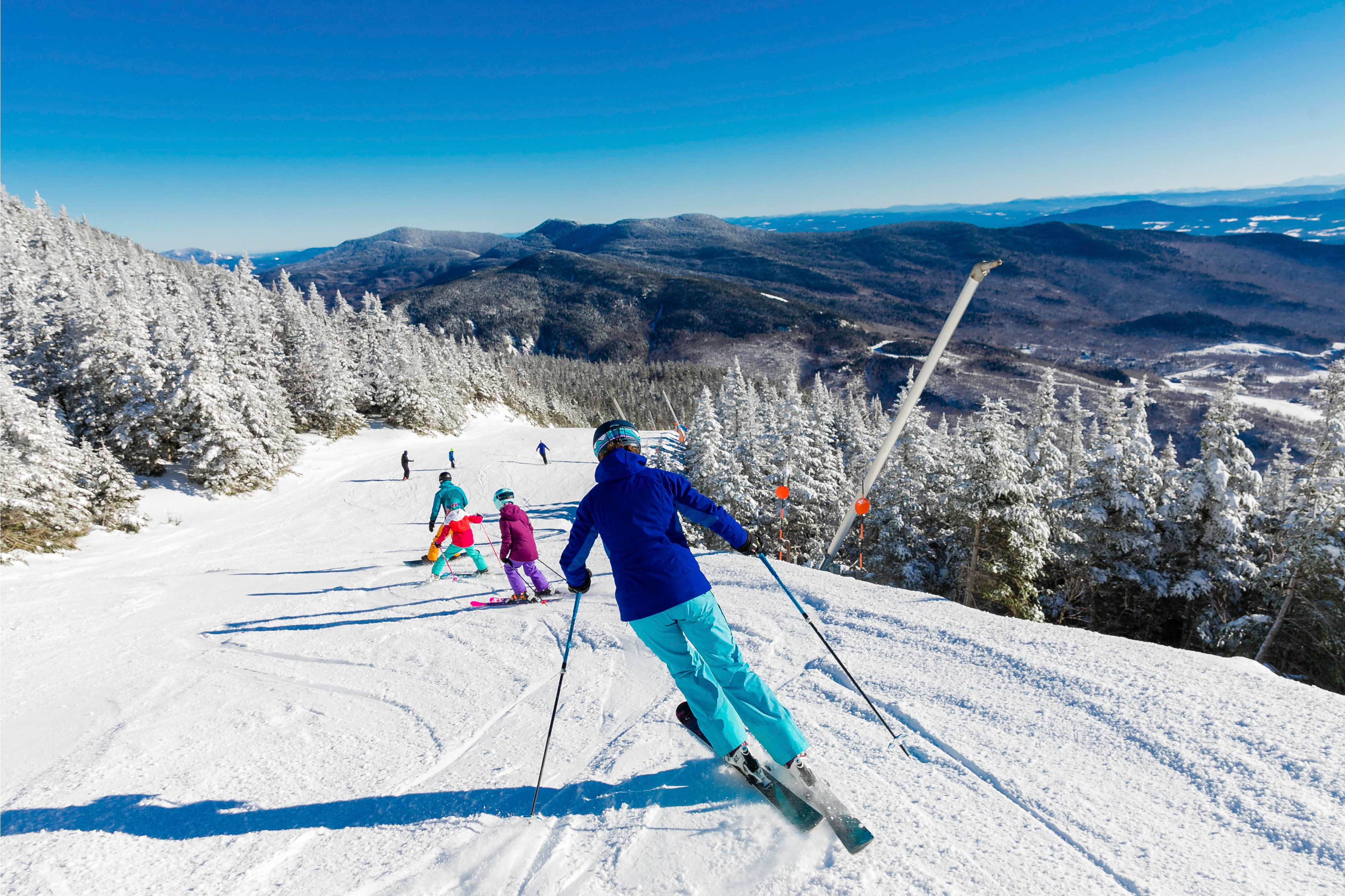 Family skis together in Stowe, VT.