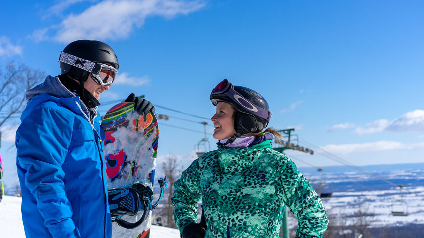 Two Friends Talk on the Summit at Whitetail
