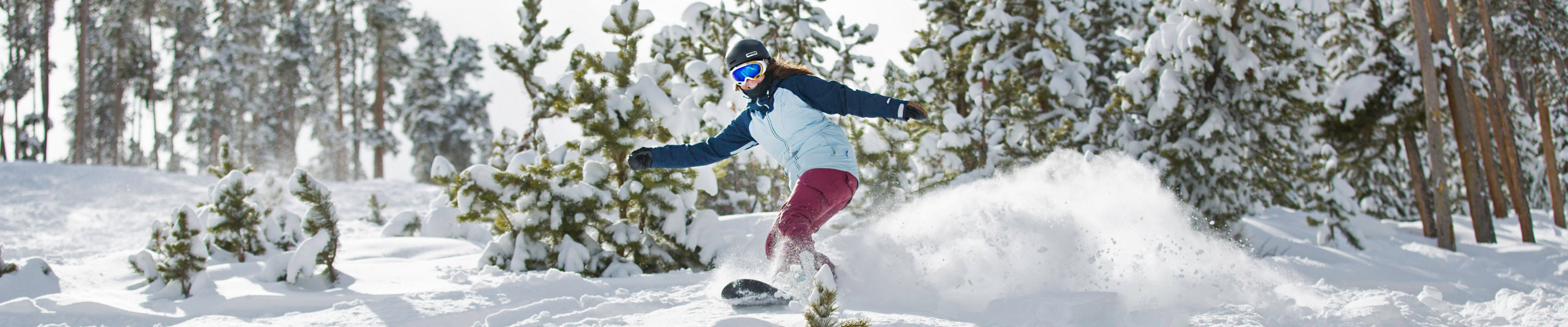 Snowboarding fresh powder in Keystone, CO