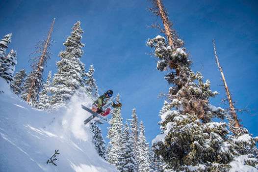 Skier in fresh snow in Crested Butte, CO.