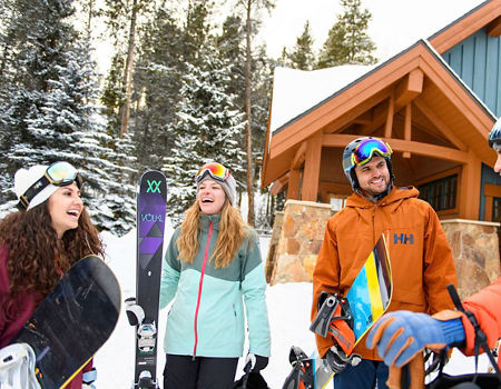 Friends leave condo to ski and snowboard in Breckenridge, CO.