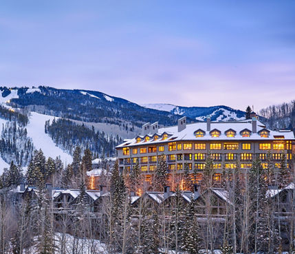 The Pines Exterior with Ski Lift & Runs in the background