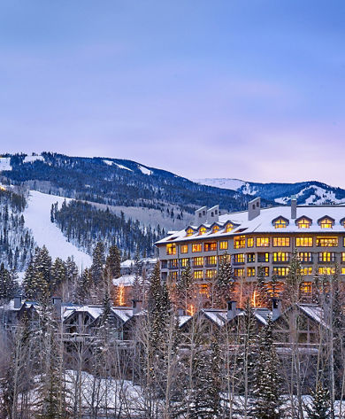 The Pines Exterior with Ski Lift & Runs in the background