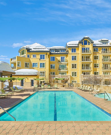 Heated Outdoor Swimming Pool on a Sunny Winter Day at Condo at Vail Mountain