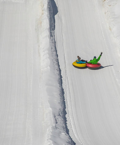 Family tubing at Adventure Point in Keystone, CO.