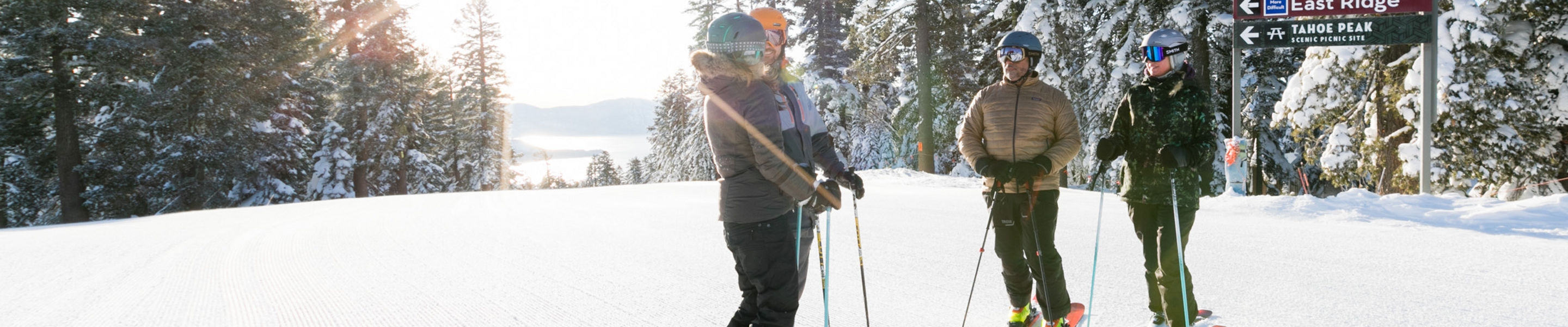 Couples Chat at the Top of Northstar California Before Taking a Run