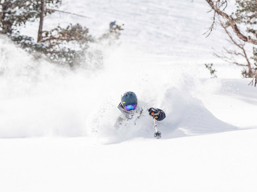 Skier enjoys deep powder in Kirkwood, CA.