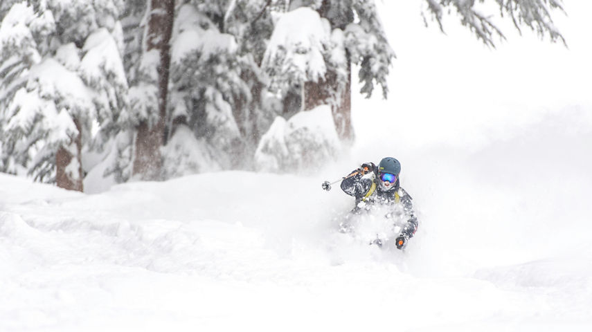 Skier enjoys deep powder in Kirkwood, CA.