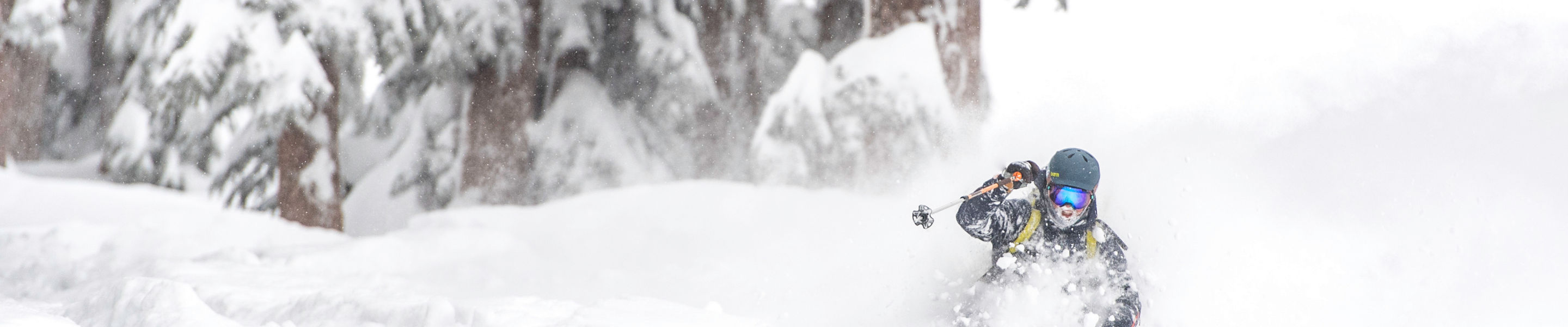 Skier enjoys deep powder in Kirkwood, CA.